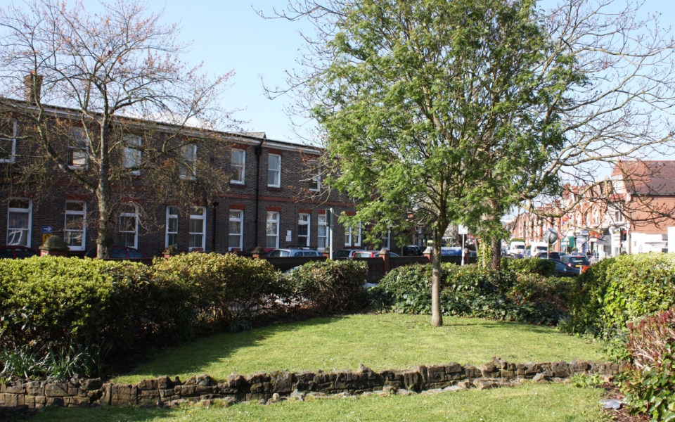 The Rush, Kingston Road, Merton Park, SW19. The Rush Island, looking west towards the Nelson Hospital. The 1942 Hospital extension is on the left.