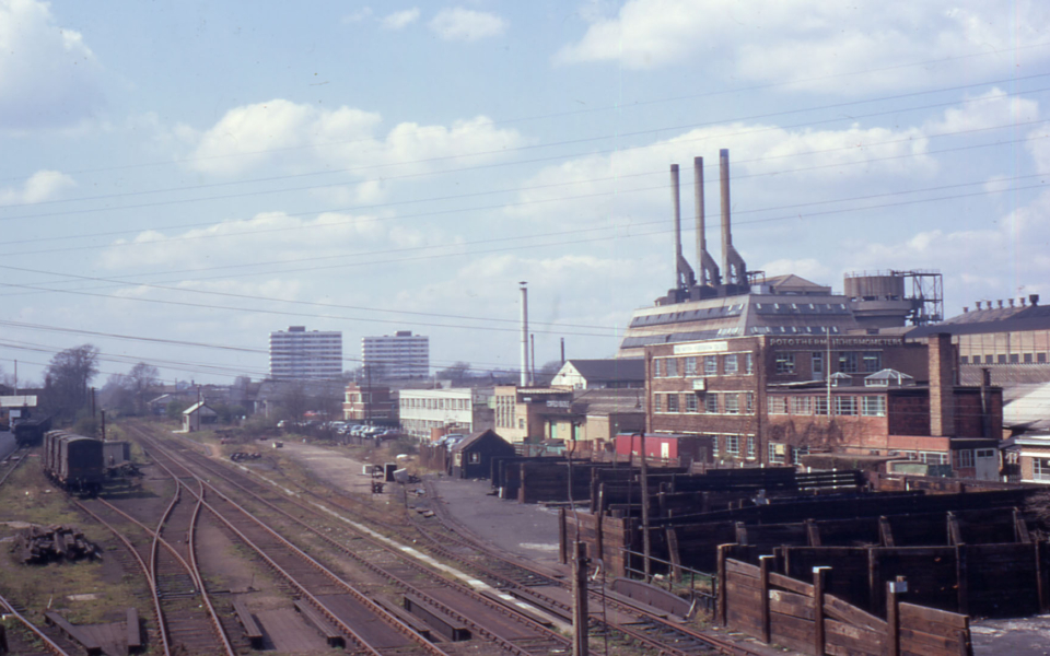Railway and Board Mills, Merton, London SW 19. From Christchurch Bridge. The site of Merton Abbey. The railway route is now (2009) Merantun Way. and site of Board Mills is now Sainsbury