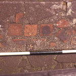 Medieval floor tiles from Merton Abbey, Moved to Ravensbury Park.