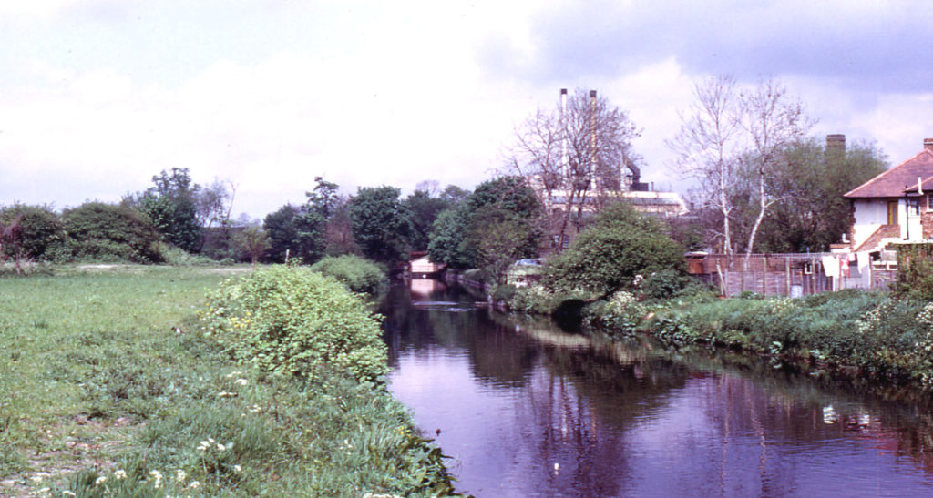 River Wandle above Liberty's, Merton, London SW 19. From Windsor Avenue.