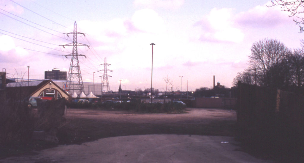 Car park at Merton Abbey Mills, Merton, London SW 19. Looking east. Site of Bennett