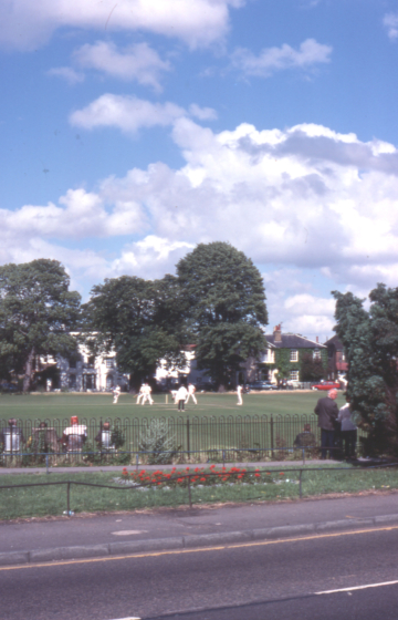 Cricket match on Lower Green, Mitcham, Surrey CR5.