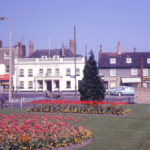 The White Hart, 350 London Road, Mitcham, Surrey CR4. Looking west. with tulips at the Cricket Green.