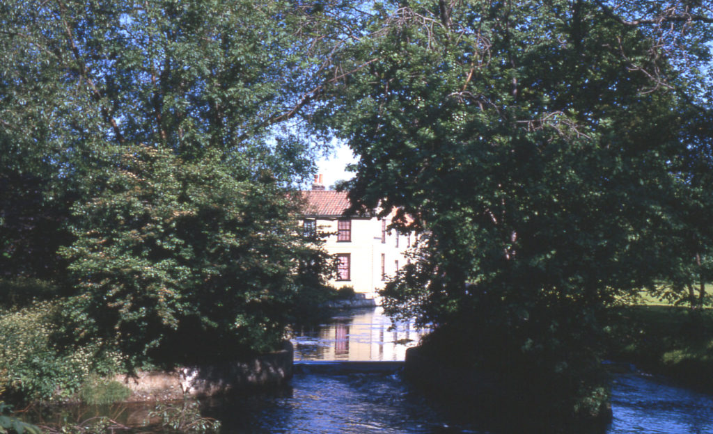 River Wandle from London Road Bridge, Mitcham, Surrey CR4. Looking upstream. The former