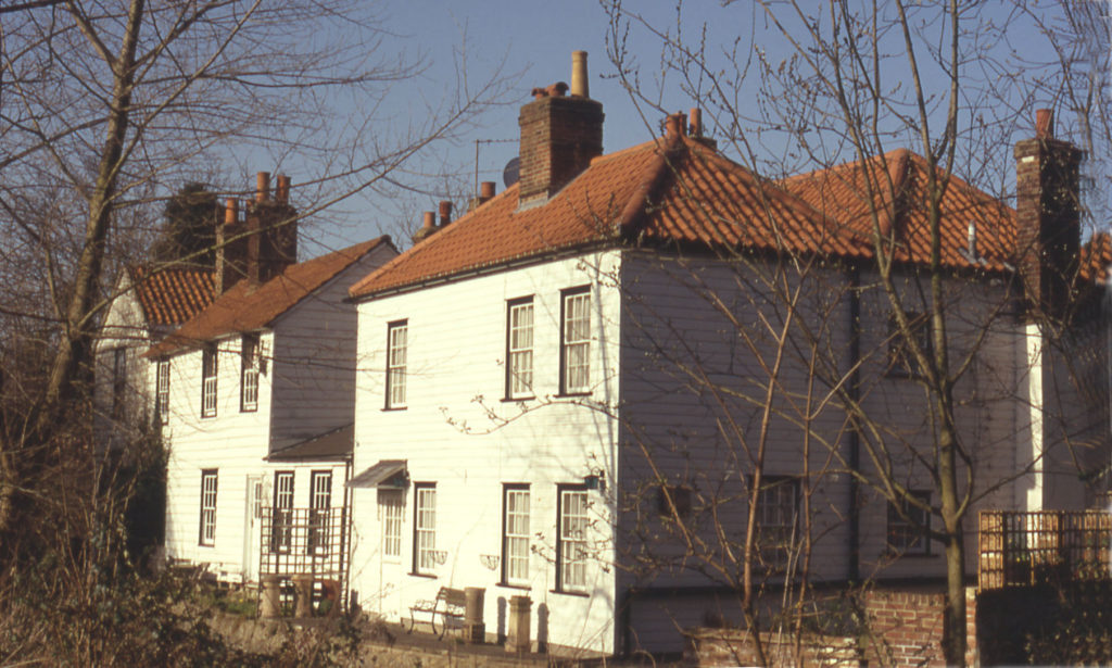 Mill Cottages from Watermeads, Mitcham, Surrey CR4. Nos. 475-479 (right) London Road.