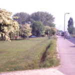 Junction of Carshalton Road and Arnies Lane, Mitcham Common, Mitcham, Surrey CR4. Looking north.