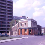 The Bath Tavern, Belgrave Walk, Phipps Bridge Estate, Mitcham, Surrey CR4. Victorian. Replaced in 1968 by a new Bath Tavern in Haslemere Avenue. The old building was demolished in the mid-1970s.