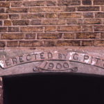 Dated stone on cottages in Century Road, Mitcham, Surrey CR4.