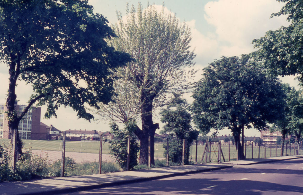 Eastfields from Grove Road, Mitcham, Surrey CR4. The playing fields of Eastfields High School.