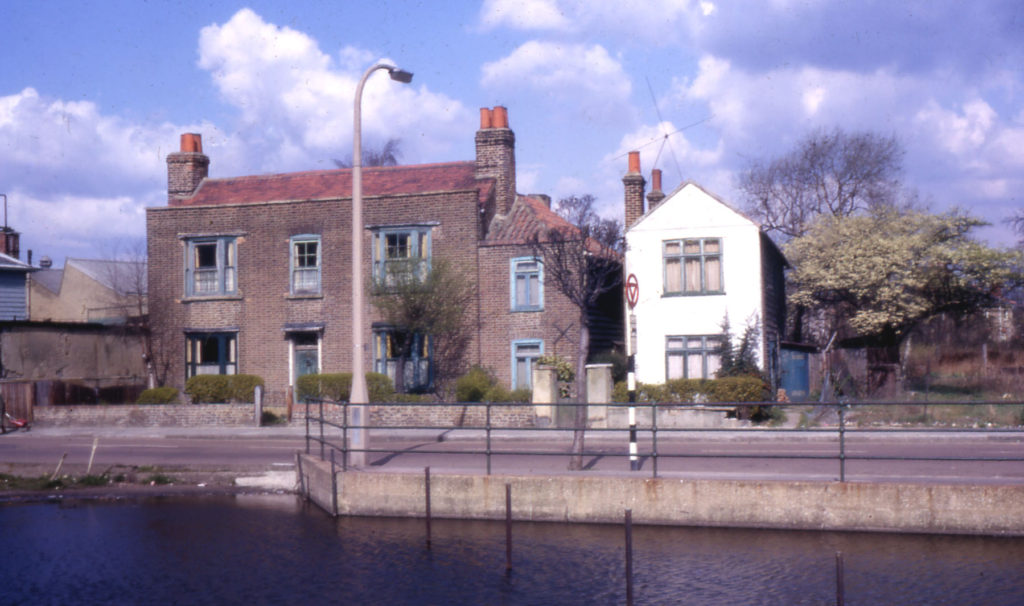 9 & 11 Commonside East, Mitcham, Surrey CR4. Three Kings pond in foreground.
