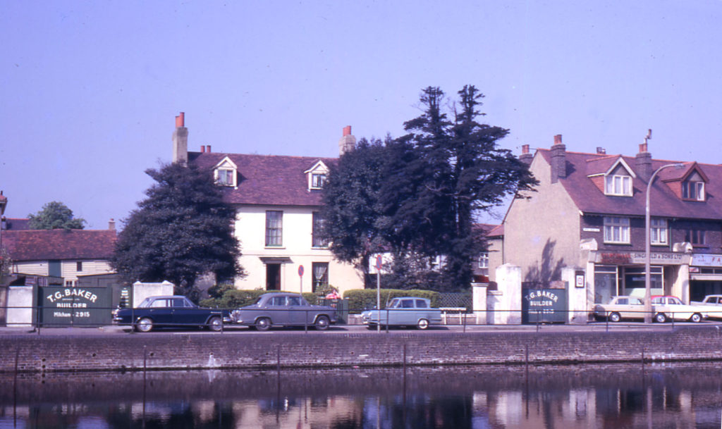Commonside West, Mitcham, Surrey CR4. Three Kings Pond in foreground. Newton House on left.
