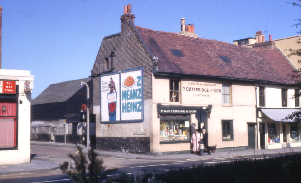 Gutteridges' shop, 29 Upper Green east, Mitcham, Surrey CR4. Corn and Forage Merchants. Building dated for early 18th century. Demolished 1969. Barclays Bank now stands on the site.