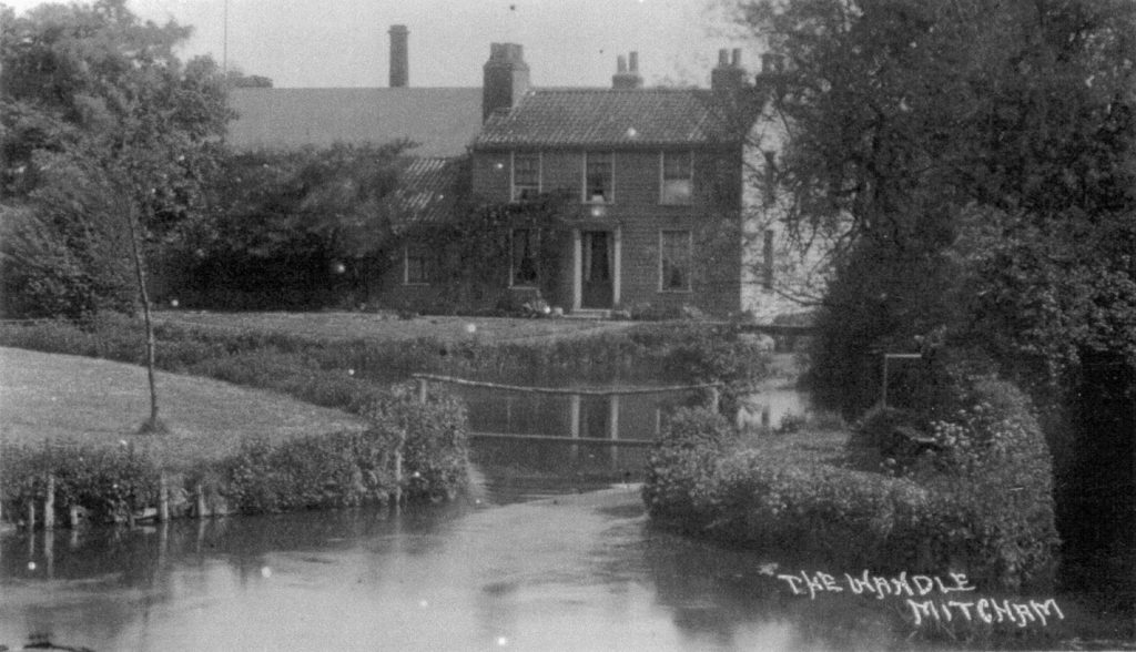 'The Wandle, Mitcham'. Mill cottages above Mitcham Bridge. Undated postcard.